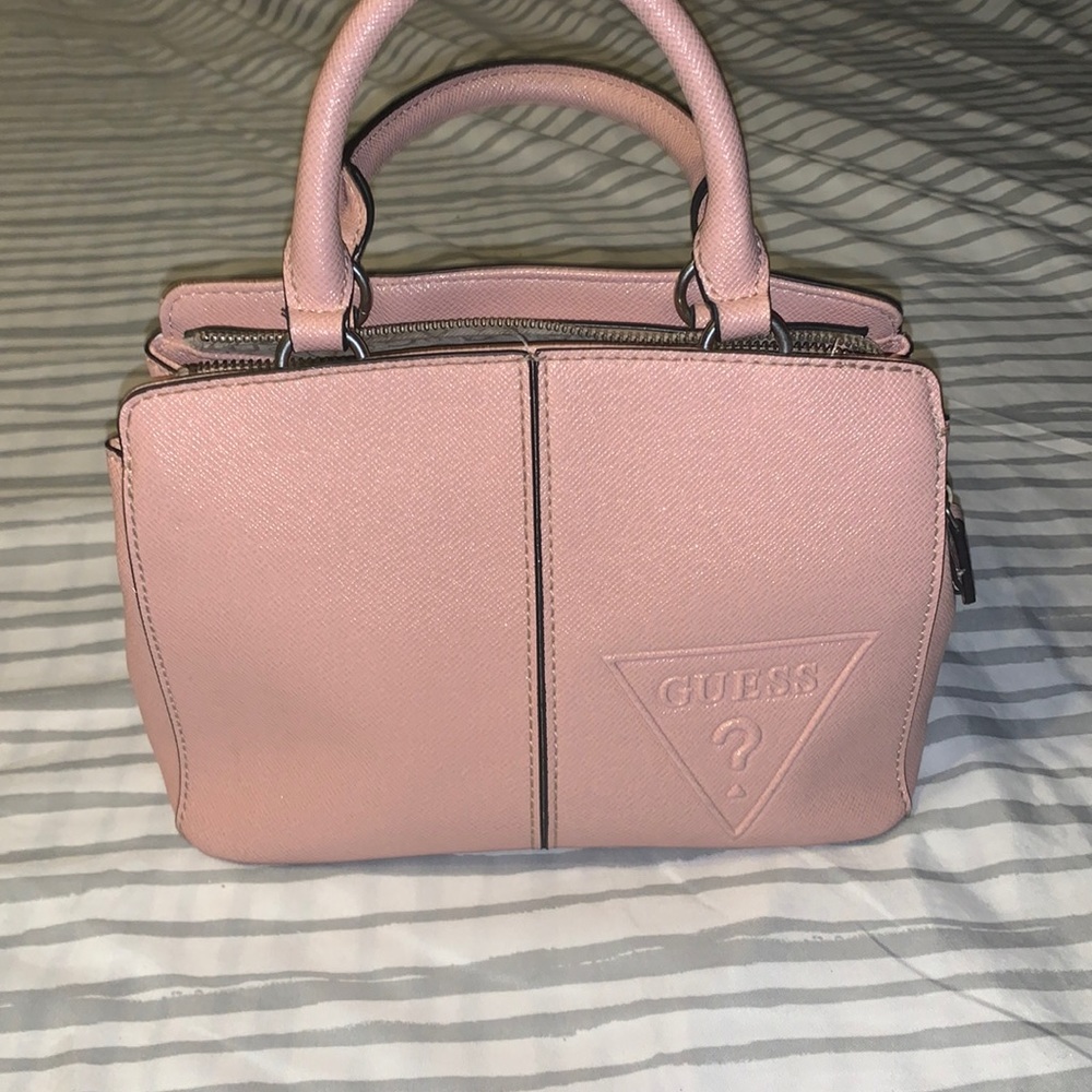 Salmon pink sparkly Guess bag.